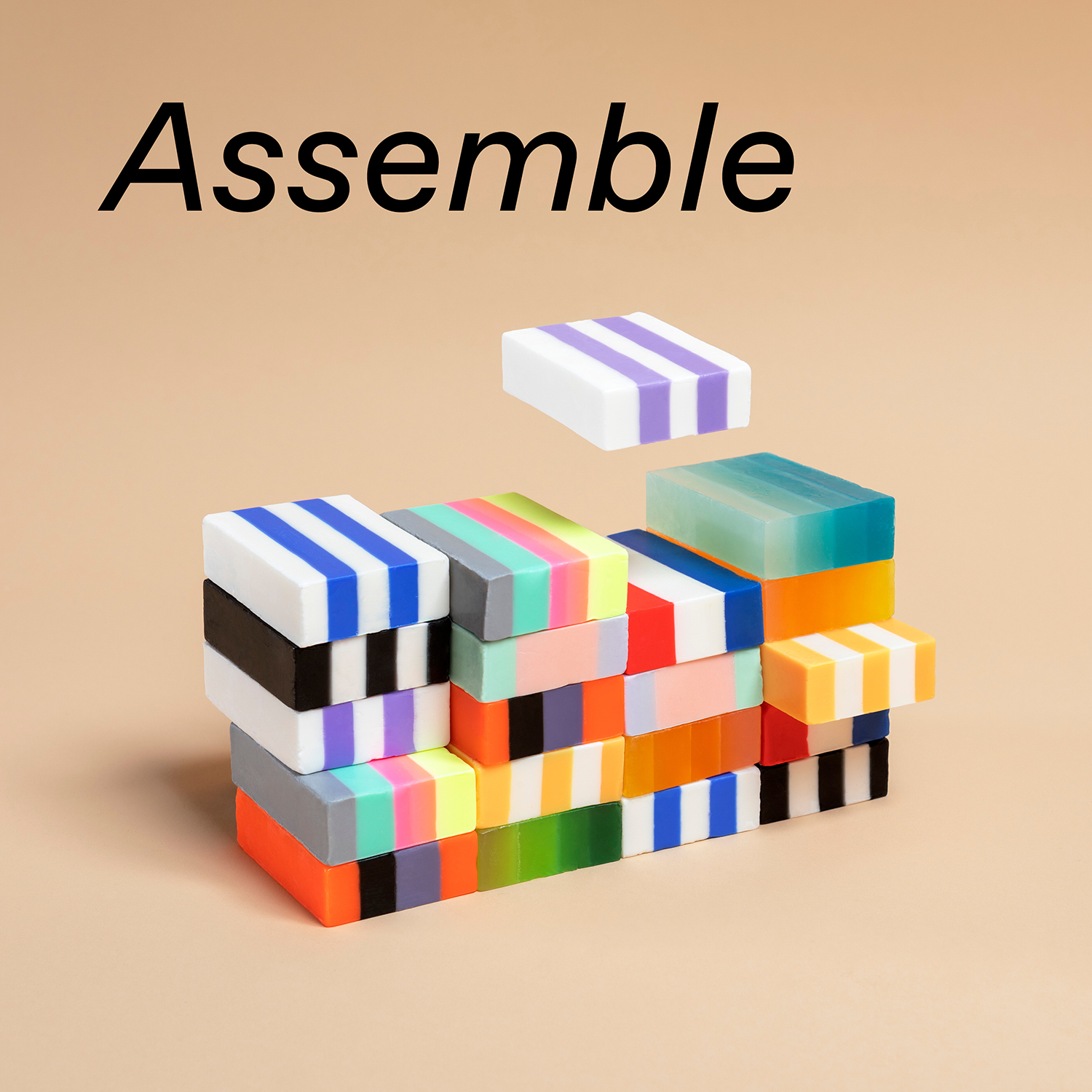 Ein Stapel mehrfarbiger Bausteine steht für das Zusammenführen (englisch: Assemble) bei Euresearch 